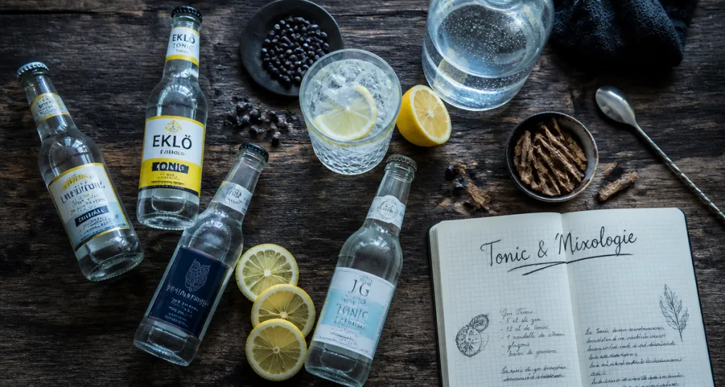 Tonic water artisanal, ingrédients cocktail, table bois